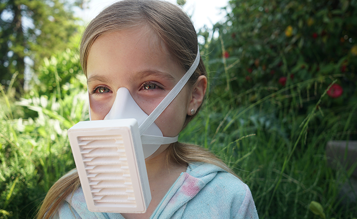 Young girl wearing a Conforming Respirator Design