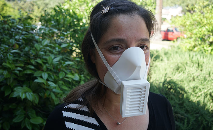 Woman wearing a Conforming Respirator Design